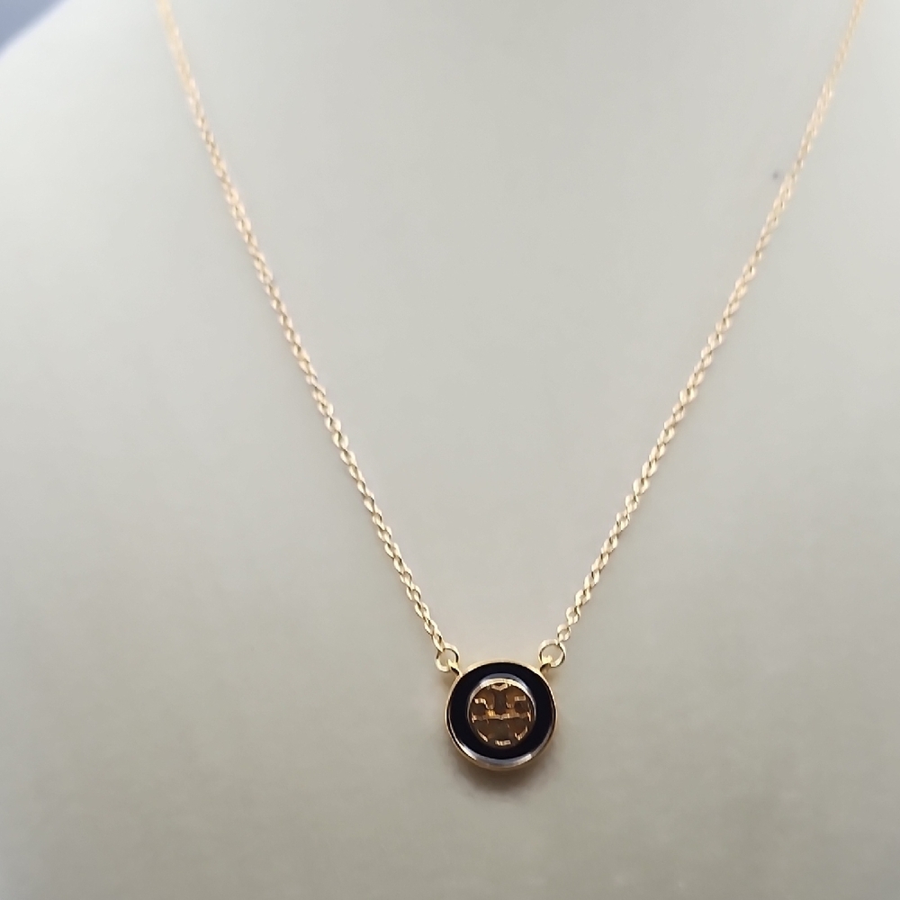 Tory Burch Black and Gold Emblem Necklace - Picture 3 of 9